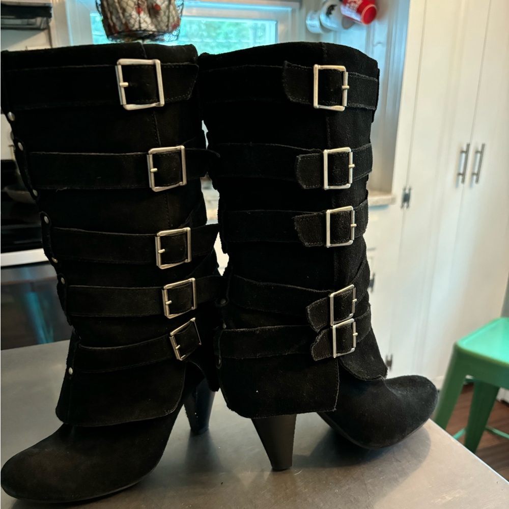 Women’s black size 8 suede heeled boot with buckles.